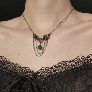 Vintage silver necklace with a green bead